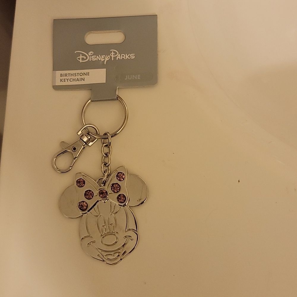 NWT, Disney Parks, 7 lavender June Birthstone Minny Mouse Key Chain. BEAUTIFUL